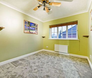 A modern three bedroom home with garage and off-street parking in a... - Photo 4