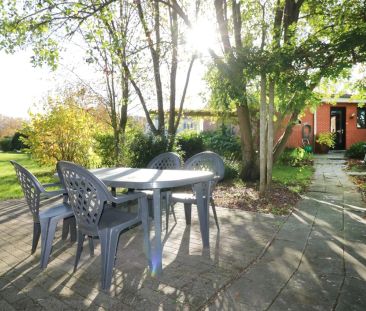 Rustig gelegen woning met 2 slpk, riante tuin en garage te Herselt - Photo 4