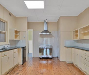 Classic Comfort in Centenary Heights - Photo 3