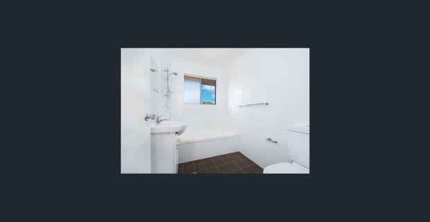 Conveniently Located Two Bedroom Unit - Photo 1