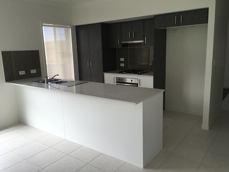 Family Home in Coomera Springs with Several Living Areas and Large Yard - Photo 4