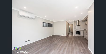 Modern 3-Bedroom Residence with Quality Finishes & Double Garage - Photo 2