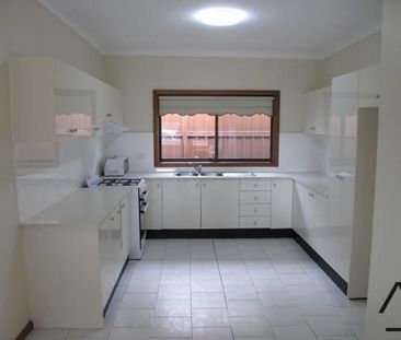 Spacious Brick Family Home with Generous Living in Greenacre - Photo 5