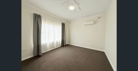 Comfortable 3-Bedroom Home in Convenient Queenstown Location - Photo 4