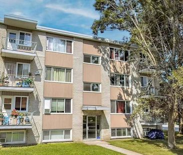 GRAND 4 ½|CHAUFFAGE-EAU CHAUDE - Photo 3