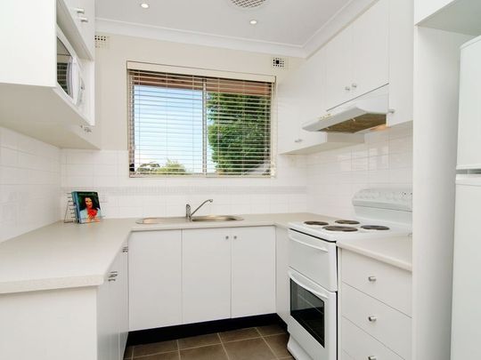 Stylish Two Bedroom Unit With Balcony - Photo 1