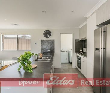 Trendy Coastal Living in Beachside Waikiki - Photo 1