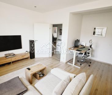 Zentrale, moderne 2,5-Zimmer Wohnung mit Balkon, Einbauküche und su... - Photo 1