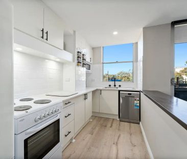 “Ideally Located and Tastefully Renovated!” - Photo 4