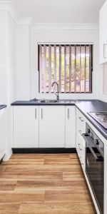 RENOVATED 2 BEDROOM UNIT WITH SPLIT AIR CONDITIONER - Photo 3