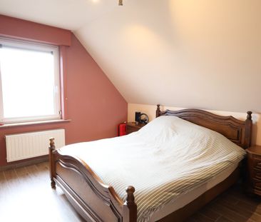 Verzorgde half open woning met mooie rustige ligging - Photo 1