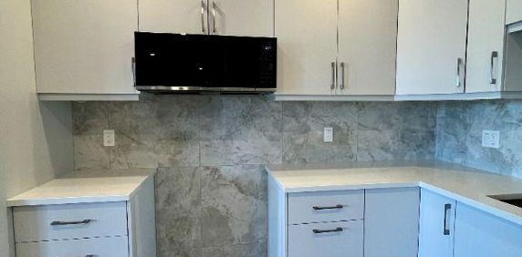 Condo 4 1/2 entièrement rénové vue fleuve - Photo 2