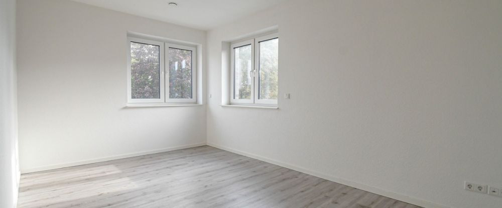 6476 - Moderne Obergeschosswohnung mit Einbauküche und Pkw-Stellplatz in zentraler Lage von WST! - Foto 1