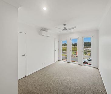 MODERN, SPACIOUS & LOW MAINTENANCE LIVING IN THE HEART OF AURA! - Photo 4