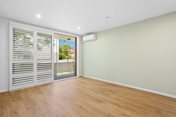 Stylish Coastal Living in a Prime Lifestyle Location - Photo 1