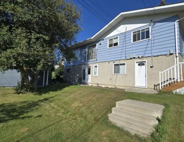 Utilities Included! Three bedroom lower suite | 11B Highland Place NW, Calgary - Photo 1