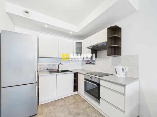 Dwa pokoje z garażem na strzeżonym osiedlu - Zdjęcie 1