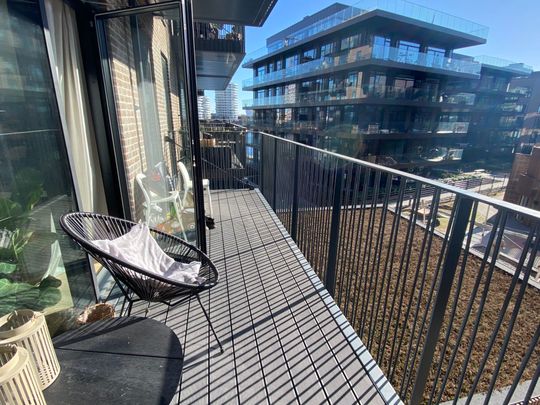 Water view, Balconies and 3 bedrooms - Photo 1