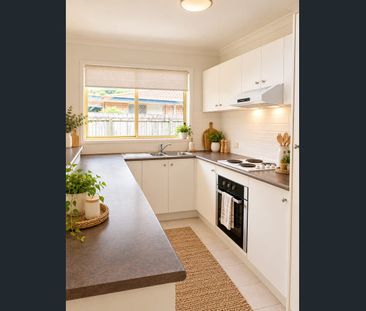 Stylishly Refreshed Townhouse with Unbeatable Convenience - Photo 4