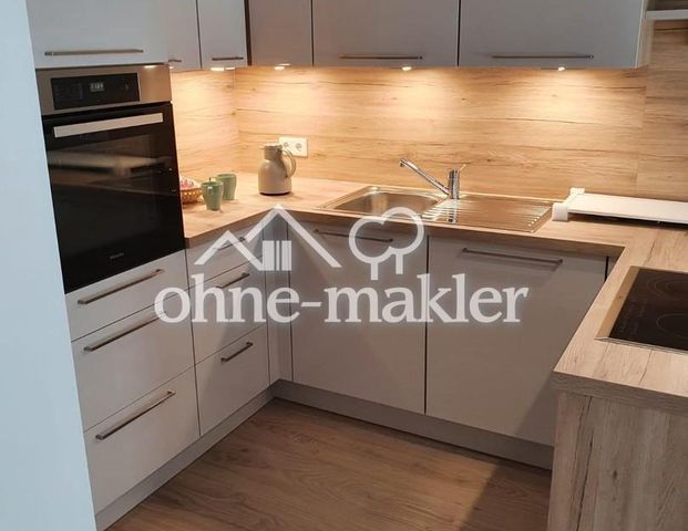 Moderne 3-Zimmer-Wohnung mit Garten und Tiefgarage - Photo 1