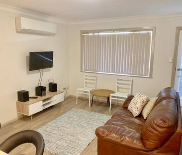 MODERN UNIT JUST MOMENTS FROM THE CBD - Photo 1