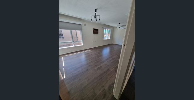 NEAT AS A PIN & MINUTES TO ALL AMENTIES - Photo 1