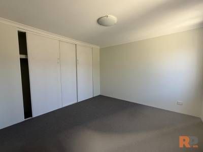 Low Maintenance 3x2 Unit in Small Complex - Photo 1