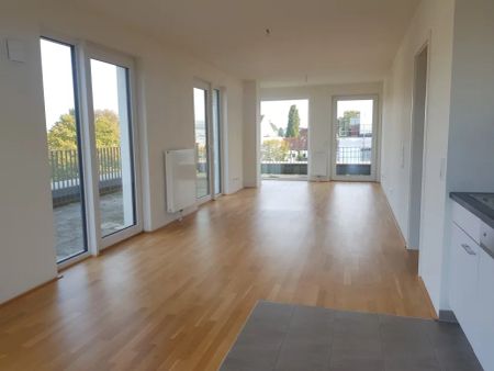 Familienfreundliche Wohnung mit sonnenverwöhnter Dachterrasse! - Foto 2