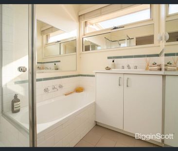Immaculately presented three-bedroom dwelling in an ideally located... - Photo 6