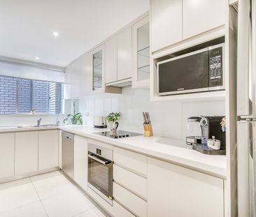 Impeccably presented and filled with natural light this is a must t... - Photo 3