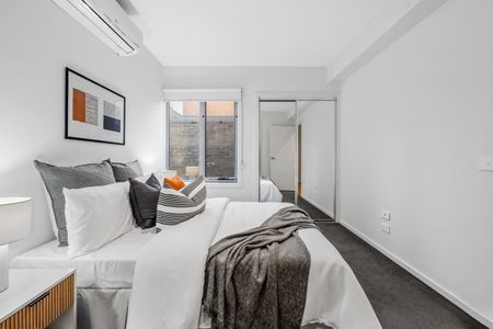 Spacious Two-Bedroom Design with Private Bathrooms - Photo 5