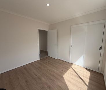BRAND NEW FAMILY HOME IN A CONVENIENT CLYDE NORTH LOCATION! - Photo 3