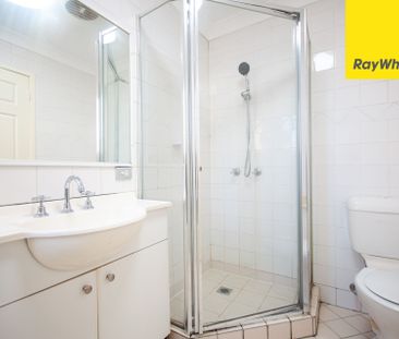 UPDATED STREET-FACING TOWNHOUSE WITH SPACE, STYLE & CONVENIENCE - Photo 6