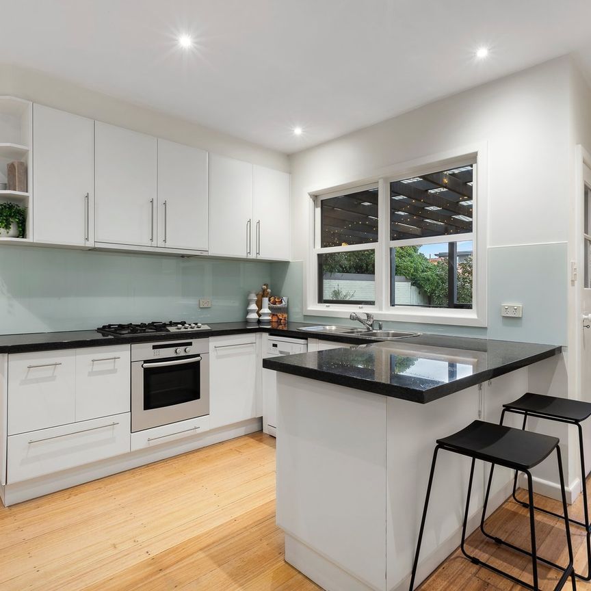 Neat & Tidy 3 Bedroom Home On a "Beach-Side of the Highway" Position! - Photo 1