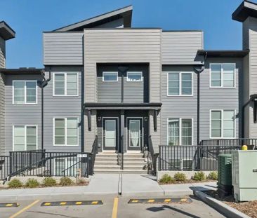 Exquisitely Furnished Walkout Apartment | 312 - 260 Rowley Way Northwest, Calgary - Photo 1