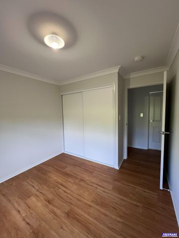 BRAND NEW 3-BEDROOM, 2-BATHROOM HOME - Photo 4