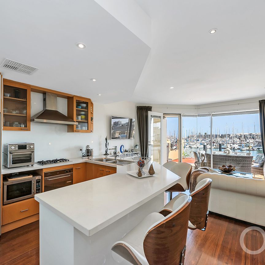 Open the Door to Waterfront Luxury and Marina Views - Photo 1