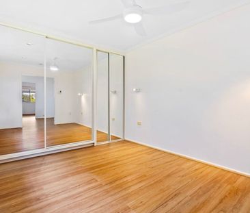 Two Bedroom Top Floor Unit in a Stunning Location with Water Views! - Photo 4