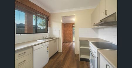 Comfortable Two-Bedroom Unit in Convenient Location - Photo 4