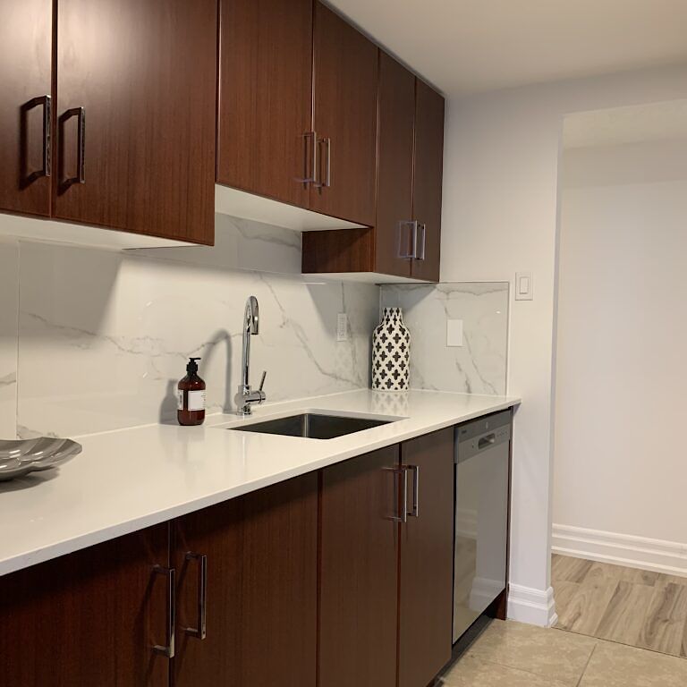 Steps to the Lyon O-Train Station: Building amenities include a gym, party room, lounge, and rooftop patio - Photo 1