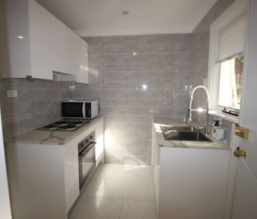 Renovated unit attached to Resident Landlord's home near Matthew Pe... - Photo 2