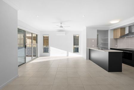 Brand-New Modern Family Home - Split System A/C & Media Room! - Photo 3