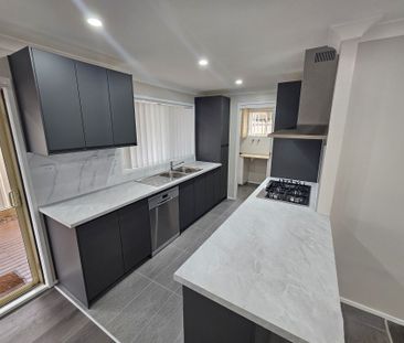 NEAT & TIDY FOUR BEDROOM HOME! - Photo 4