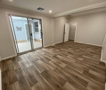 Renovated Family Home Awaiting New Tenants - Photo 2