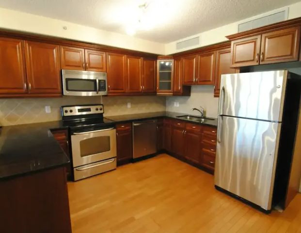 GORGEOUS VIEWS Bright 2 Bd 2 Bth Huge Kitchen Covered Parking *PAY POWER ONLY* | 9707 106 St NW, Edmonton - Photo 1