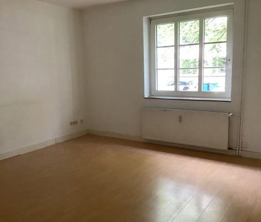 Schöne Erdgeschosswohnung in denkmalgeschütztem Haus! - Photo 6