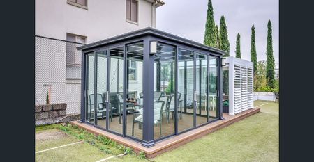 Stunning Loft-Style Unit with Large Playground and Sunroom - Photo 3