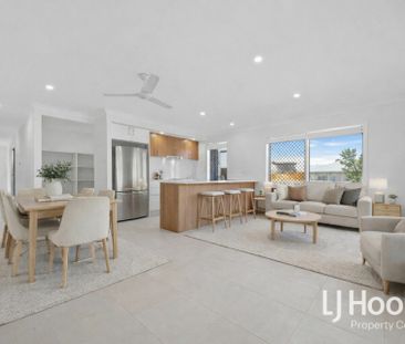 Brand New | 2 Living Zones | Modern & Low-Maintenance - Photo 2