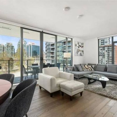 Stunning Waterfront Furnished Olympic Village Condo - Photo 1