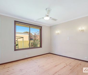 Three Bedroom Home with Large Yard - Photo 4